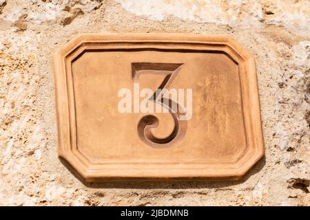Pottery Street Number Plate No. 3 On An Old House In San Gimignano Stock Photo