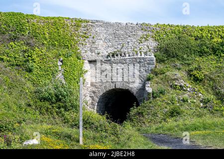 Disused arch, part of the tramway at the Tout Quarry on the Isle of Portland, Dorset Stock Photo