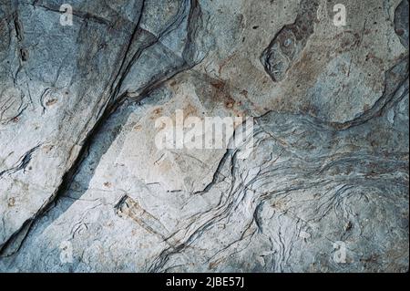 Rocky wall with uneven surface Stock Photo