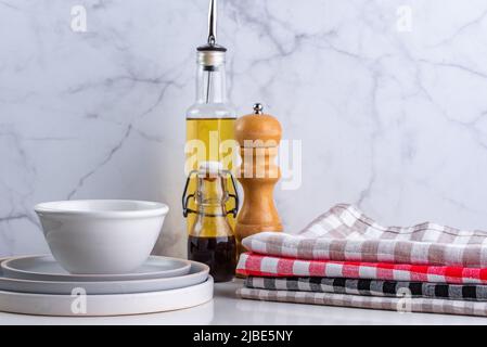 linen towels in a stack on the kitchen table Stock Photo