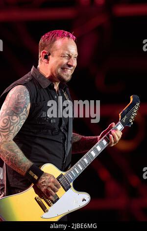 Rhineland-Palatinate, Nürburg: 05 June 2022, Michael Poulsen, frontman of the Danish metal band 'Volbeat', performs on the main stage of the 'Rock am Ring' festival. The festival is sold out with 90,000 visitors. Photo: Thomas Frey/dpa Stock Photo