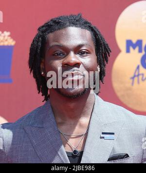 Dometi Pongo attends the 2022 MTV Movie and TV Awards at Barker Hangar ...