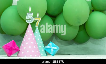 Birthday number, a beautiful card with balloons and numbers from candles, a happy birthday background for a girl. Stock Photo