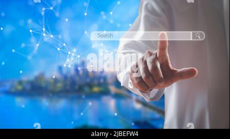 Business man clicking internet search bar on computer touch screen Blank search bar. Man hand touching search engine optimization, web banner. busines Stock Photo