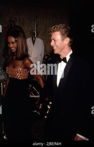 David Bowie and Iman attend Sixth Annual American Cinematheque Awards on March 22, 1991 at the Century Plaza Hotel in Century City, California. Credit: Ralph Dominguez/MediaPunch Stock Photo