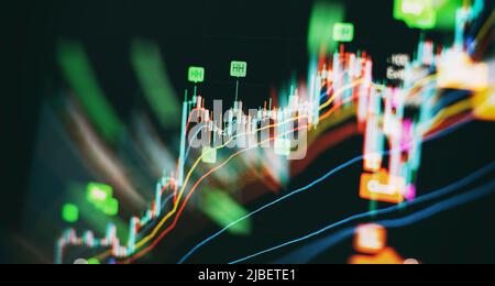 Financial statistic analysis on dark background with growing financial charts. Stock analyzing. Price chart bars. Stock Photo