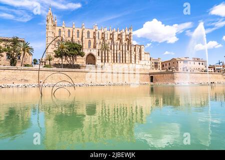 Cathedral of Mallorca and reflection pool on a sunny day in Palma, Mallorca Stock Photo