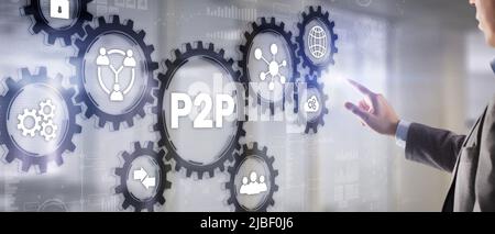Businessman presses button p2p peer-to-peer on virtual interface Stock Photo