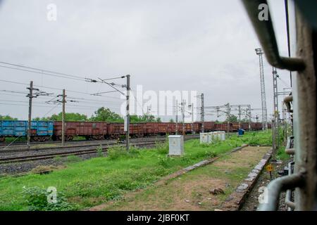 Indian Goods train and the railway track Stock Photo