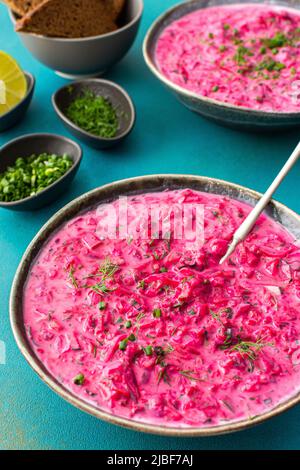 Cold soup svekolnik, Borscht or Chlodnik , soup made from boiled beets, potatoes and fresh vegetables Stock Photo