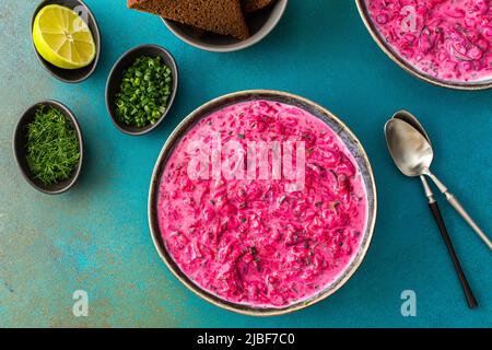 Cold soup svekolnik, Borscht or Chlodnik , soup made from boiled beets, potatoes and fresh vegetables Stock Photo