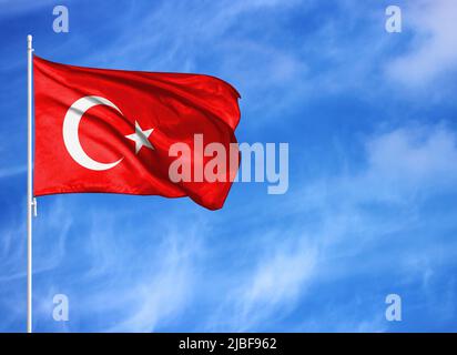 National flag of Turkey on a flagpole Stock Photo