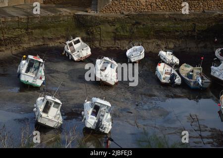 Ships on the ground, Low tide on the cost from Biarritz Stock Photo