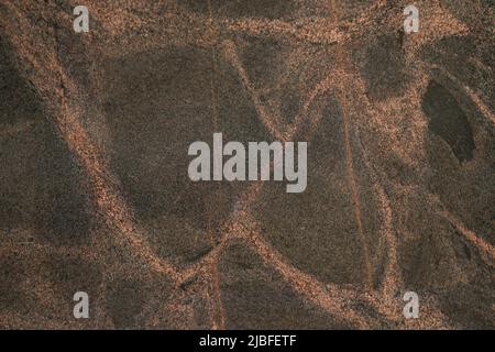 Dark grey stone texture with pink veins Stock Photo