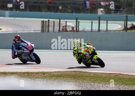 Fermin Aldeguer from Spain of Lightech Speed Up with Boscoscuro with Alessandro Zaccone from Italy of Gresini Racing Moto2 with Kalex during the Moto2 Stock Photo