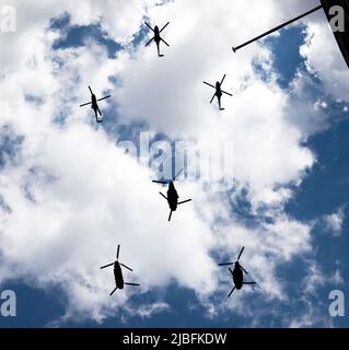 A Formation of three Puma and three Chinook Helicopters as the 4th and 5th   elements of the fly-past to  celebrate Her Majesty The Queen's Platinum Jubilee 2022 Stock Photo