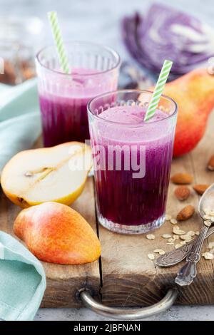 Healthy vegetable smoothie made of red cabbage and red barlett or Williams pears Stock Photo