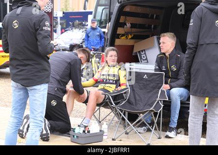 Colchester, UK. 06th Jun 2022. Stage One of the Women's Tour gets underway from the Sports Park at Northern Gateway in Colchester, finishing later today in Bury St. Edmunds. Karlijn Swinkels of Team Jumbo-Visma getting some last minute massage therapy in preparation for the race. Credit: Eastern Views/Alamy Live News Stock Photo