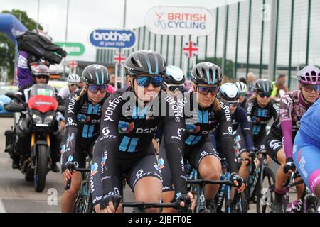 Colchester, UK. 06th Jun 2022. Stage One of the Women's Tour gets underway from the Sports Park at Northern Gateway in Colchester, finishing later today in Bury St. Edmunds. Lorena Wiebes, Megan Jastrab and Franziska Koch from Team DSM group together as the race begins. Credit: Eastern Views/Alamy Live News Stock Photo