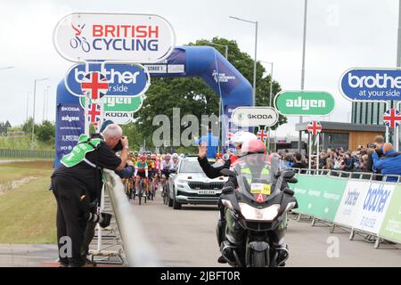 Colchester, UK. 06th Jun 2022. Stage One of the Women's Tour gets underway from the Sports Park at Northern Gateway in Colchester, finishing later today in Bury St. Edmunds. The race gets underway. Credit: Eastern Views/Alamy Live News Stock Photo