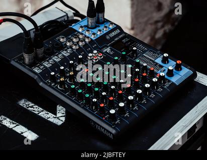 Kazan, Tatarstan, Russia. May 29, 2022. Sound mixer controller in the control room. A quality audio system for professionals. Mixer buttons and faders Stock Photo