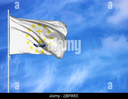 National flag of State of Rhode Island and Providence Plantations on a flagpole Stock Photo