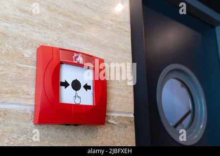 Close-up of the fire alarm switch on the wall in the corridor Stock Photo