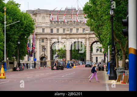 LONDON - May 18, 2022: Admiralty Arch in London, with white ensign flags and Union Jacks hanging for the Platinum Jubilee Celebrations Stock Photo