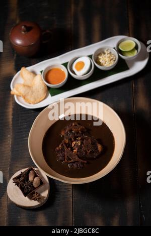 Traditional Nasi Rawon or Indonesian Black Soup Stock Photo