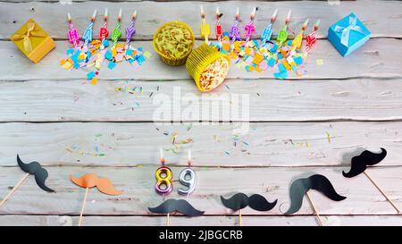 Birthday. Top view happy birthday candles, save space. Mustache barber shop congratulations on your birthday. Stock Photo
