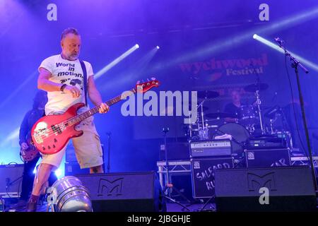 Bass guitarist/vocalist Peter Hook, formerly of Joy Division and New Order performing at the Wychwood Festival, Cheltenham, UK. June 5, 2022 Stock Photo