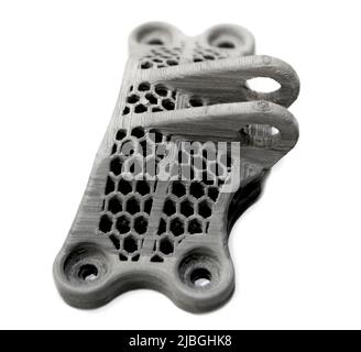 Model printed on a 3d printer made of cement concrete isolated on a white background close-up. Additive automation manufacturing 3D printing technology. Concept new modern 3d printing technologies. Stock Photo