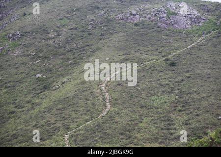 lantau trail on the range of mountain in lantau peak, lantau island, Hong Kong Stock Photo