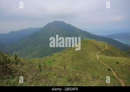 lantau trail on the range of mountain in lantau peak, lantau island, Hong Kong Stock Photo