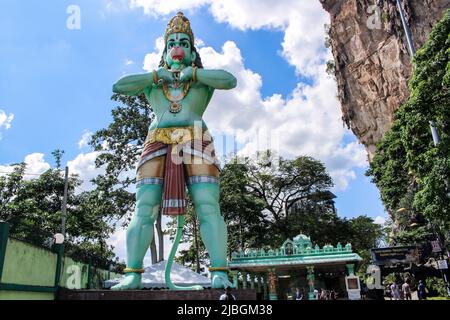 Kuala Lumpur, Malaysia - March 21, 2017 : Statue of hanuman at Batu caves in sunny day. In Hinduism, Hanuman is an ardent devotee of Rama. Stock Photo