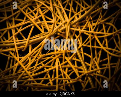 Close up of roughly knitted rattan in the dark Stock Photo