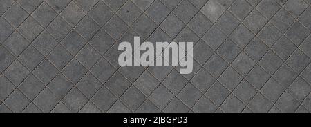 Sidewalk of square paving stones seen from above, widescreen image Stock Photo