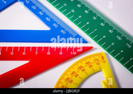 Raputer Ruler Concept image of colourful rulers and protractor in white background ...