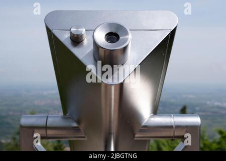 Monocular observation telescope as an attraction on a high point to look out over the surroundings. Narrow depth of field Monocular observation telescope as an attraction on a high point to look out over the surroundings. Narrow depth of field