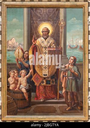 BARI, ITALY - MARCH 3, 2022: The painting of St. Nicholas in the church Chiesa San Ferdinando by Umberto Colonna from 20. cent. Stock Photo