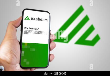 San Francisco, USA, June 2022: hand holding a phone with Exabeam mobile application on screen. Exabeam is a leading provider of the software for analy Stock Photo