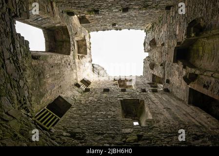 Looking up in one of the towers at Harlech Castle, Gwynedd, North Wales. Stock Photo