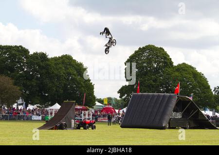 The Bolddog Lings Freestyle Motorcross Team wow the crowds at the Suffolk Show in Trinity Park, Ipswich. Stock Photo