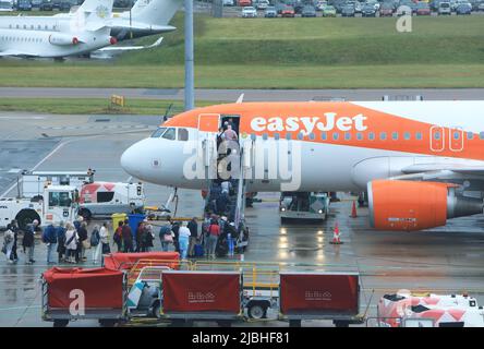 Easyjet one of the airllines cancelling flights as travel disruption continues in June 2022, with a surge in bookings, but a shortage of staff, after Covid and Brexit, and IT issues, UK Stock Photo