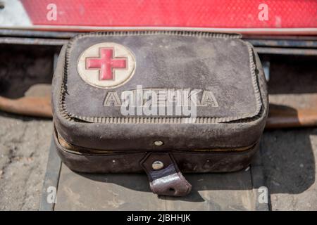 Vintage car first aid kit isolated outside background Stock Photo
