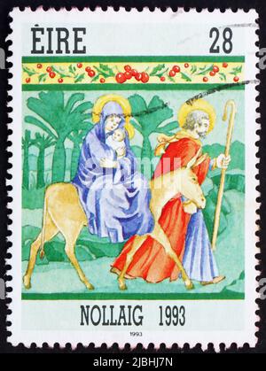 IRELAND - CIRCA 1993: a stamp printed in the Ireland shows Flight into Egypt, Christmas, circa 1993 Stock Photo