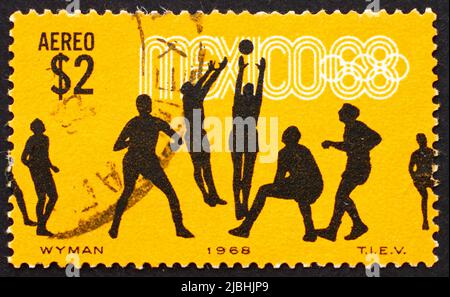 MEXICO - CIRCA 1968: a stamp printed in the Mexico shows Volleyball, 19th Olympic Games, Mexico City 68, circa 1968 Stock Photo