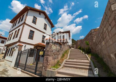 Ankara Castle and traditional Turkish houses with partly cloudy sky. Travel to Ankara background photo. Stock Photo