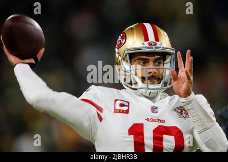 Green Bay, United States. 22nd Jan, 2022. San Francisco 49ers' Jimmy Garoppolo (10) throws during warmups before a NFC divisional playoff NFL game against the Green Bay Packers at Lambeau Field in Green Bay, Wisconsin, on Saturday, Jan. 22, 2022. (Photo by Nhat V. Meyer/Bay Area News Group/TNS/Sipa USA) Credit: Sipa USA/Alamy Live News Stock Photo