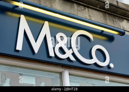 Warminster, Wiltshire, UK - October 12 2014: M&Co. Store Sign in Warminster, Wiltshire, England, UK Stock Photo